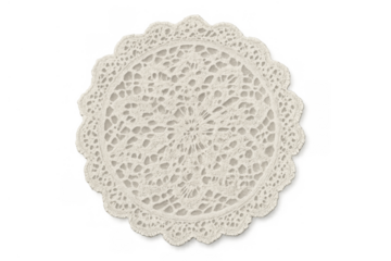 White crochet doily with intricate lace pattern isolated, offering a handmade vintage textile detail for decoration