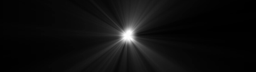 Obraz premium Bright white light source radiating beams of light across a dark black background image