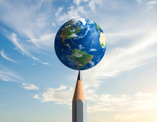 A stylized image of the world is perfectly balanced on the sharp point of a colossal, newly sharpened pencil.