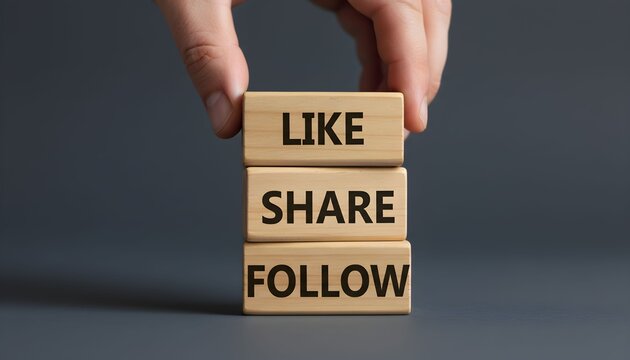 A hand stacking wooden blocks with the words Like, Share, and Follow, representing a social media engagement strategy. - Powered by Adobe