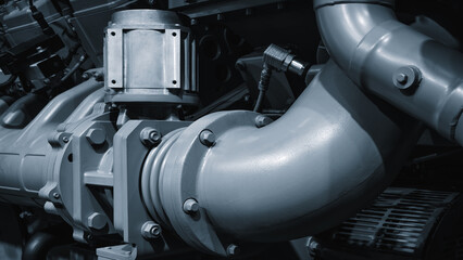 Industrial large gas diesel electric generator bottom up view, industrial background.