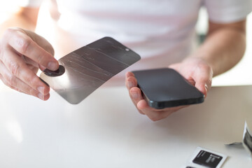 The process of replacing a protective glass on a smartphone
