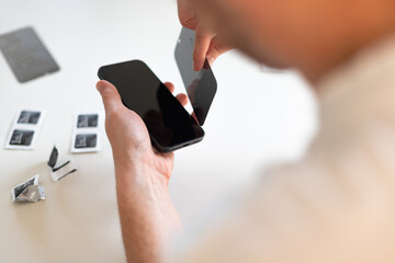 The process of replacing a protective glass on a smartphone