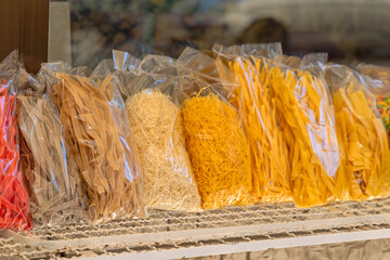 Various Shape and Size of Italian Style Pasta in Bags at Shelf