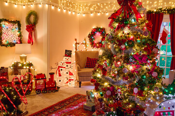 Festive living room decorated with illuminated Christmas tree, wreaths, string lights and holiday ornaments