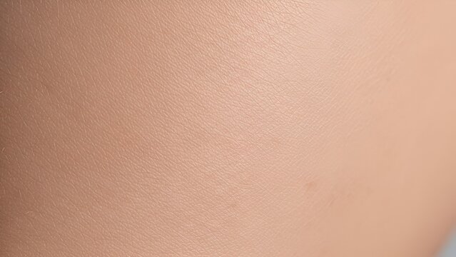 Detailed texture of healthy human skin surface as a neutral background