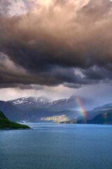 Rainbow over Nordfjord Mountains in Norway