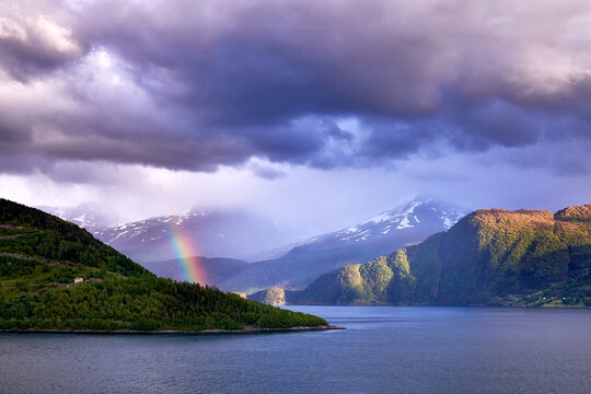 Rainbow over Nordfjord Mountains in Norway