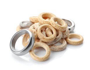 Rings and Sushki - A Stack of Silver and Dried Bread Rings.