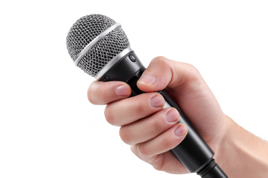 Person holds a microphone in one hand ready to speak or perform in a clear setting with no background distractions