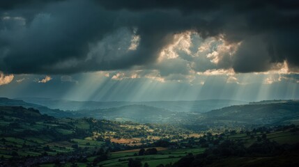 Dramatic Thunderstorm Sky Landscape Over Rolling Hills With Sun Rays Breaking Through Clouds in the Countryside