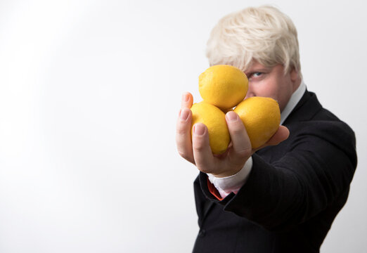 Portrait of a businessman. Working. Business concept. Lemon. People. Photo. Background.
