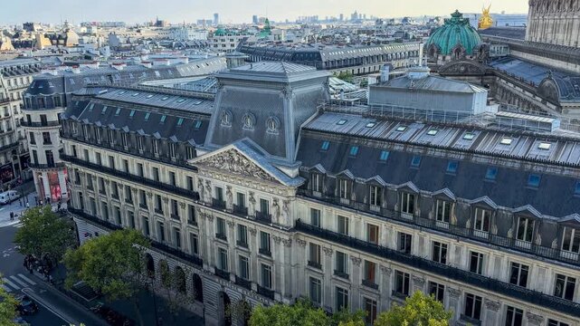 A panoramic view of the rooftops of historic central Paris from Galeries Lafayette. Paris, France, October 15, 2025. High quality 4k footage