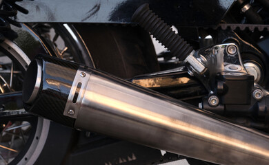 Obraz premium Close-up of the exhaust pipe of a vintage motorcycle.