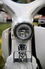 Close-up of the headlights of a vintage motorcycle.