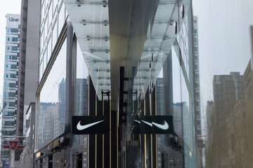 Fototapeta premium abstract projecting sign of Nike Bloor, a sportswear store, located at 23 Bloor St E, Toronto