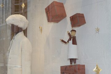 Fototapeta premium display window with mannequins at Loro Piana, a clothing store, located at 111 Bloor St W, Toronto