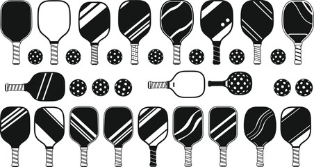 Collection of black and white pickleball paddles and balls with various patterns sport game