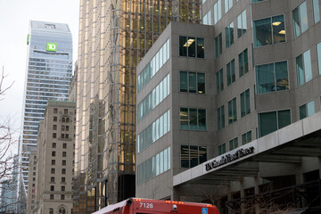 Naklejka premium looking west on Front St W to office towers, Royal York hotel, and TD Terrace on a cloudy day, Toronto