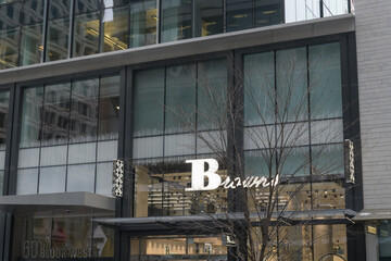Naklejka premium exterior building facade and sign of Browns, a shoe store, located at 60 Bloor St W, Toronto
