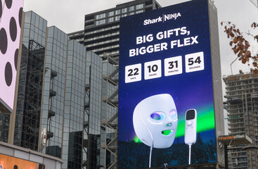 Naklejka premium digital billboard featuring ad for Shark and Ninja facing Sankofa Square, Toronto