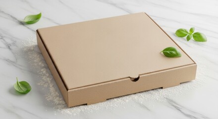 A brown pizza box sits on a white marble surface surrounded by green leaves and scattered flour.