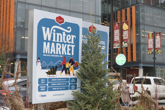 City of Toronto announcement street signs near Winter Market at St Lawrence Market, Front St E and Market St