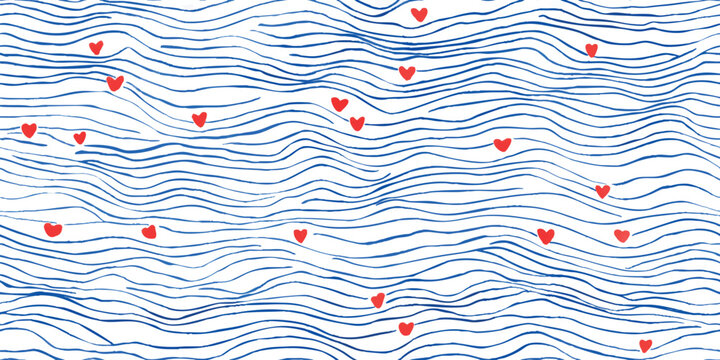 Abstract maritime seamless pattern of hand-painted blue wavy lines scattered with small red hearts for nautical apparel and design.
