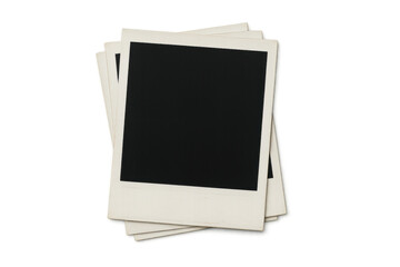 Stack of instant camera prints with blank black screens and white borders. Empty templates for memories on a transparent background