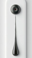 Black Sphere Dripping Liquid on White Surface