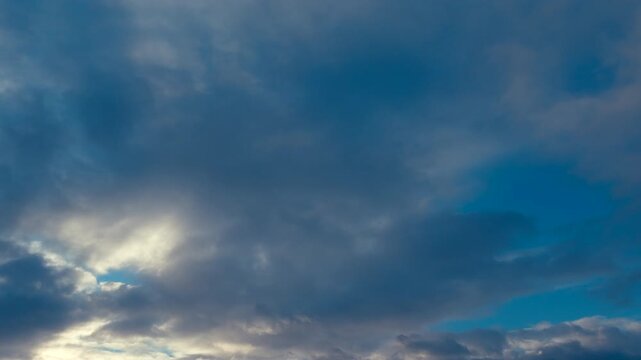 Dramatic overcast of cloud on an autumn chilly day at sunset.
