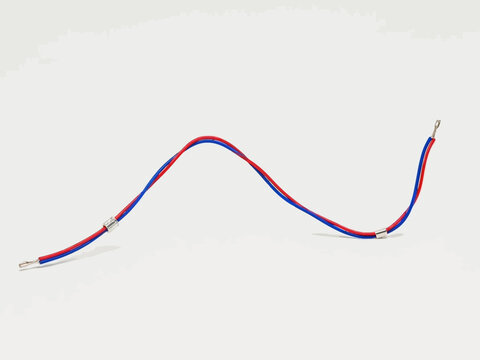 Abstract close-up of a blue and red cable with metal connectors against a white backdrop