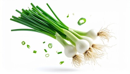 Fresh green onions with roots and chopped pieces, isolated on white background, vibrant spring onions for cooking and healthy eating