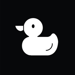 Rubber duck icon vector. White bath toy silhouette isolated on black background. Simple flat bird symbol for baby shower, bathroom logo, or web interface.