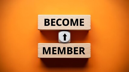 Wooden blocks spell out become member with arrow symbol