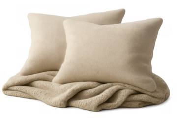 Beige pillows resting on a soft, knitted blanket, presenting comfort and warmth as home decor elements. Transparent background