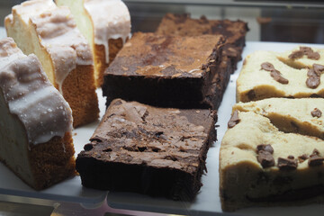Baked goods display at a cafe with different treats