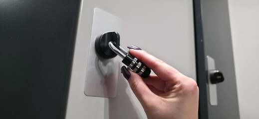 Naklejka premium A lock with a code mechanism. Protection of personal belongings using a lock with a code mechanism in lockers.