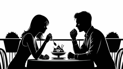 Silhouette of a romantic couple sharing dessert on a date.