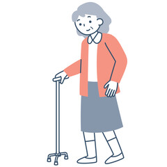 四点杖を使って歩くシニア女性