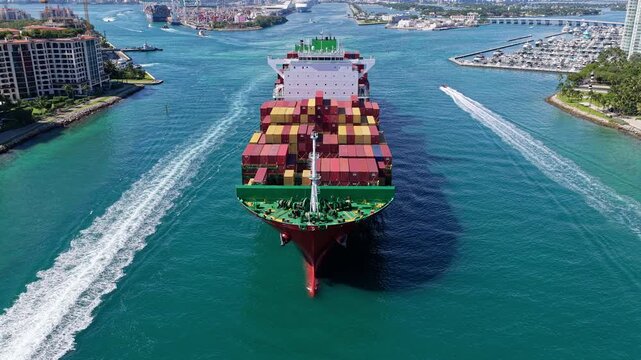 Cargo ship with container. Freight container loaded on cargo vessel. cargo ship leaving harbor. Container ship.