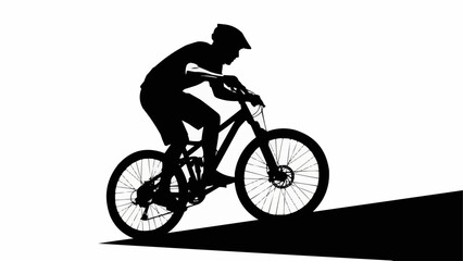 Silhouette of a mountain biker riding downhill on a trail.