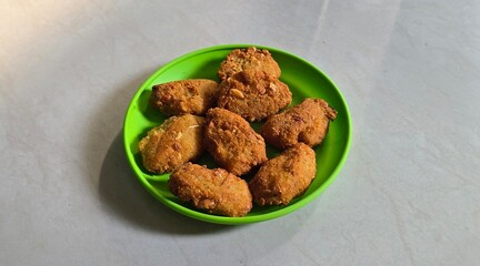 Fried grated cassava named combro in Bahasa 