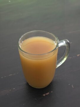 cup of beras kencur traditional drink