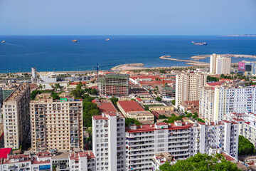 Fototapeta premium Alger the capital city of Algeria, North Africa, city centre of Algiers, the capital of Algeria, Landscape of Algiers city With port and mediterranean sea and white buildings, Arab Maghreb Africa.