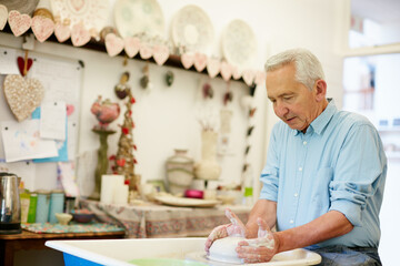 Artist, old man and mold at pottery workshop with skills for ceramics, retirement activity and fun. Creative, senior person and sculpture in art studio for clay design, diy hobby and handmade craft.