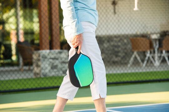 active healthy senior woman at pickleball