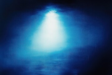 Obraz premium Blue underwater scene with a bright light beam penetrating from above, illuminating the dark water and creating a mysterious and tranquil atmosphere