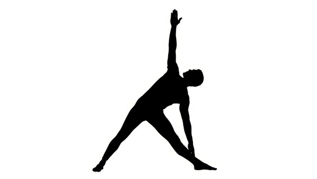 Silhouette of a man performing triangle pose yoga asana, showing balance and flexibility perfect
