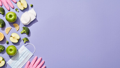 Fresh fruit and vegetables with protective gear promoting wellness and healthy eating habits, essential hygiene, and safety during challenging times